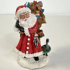 Santa Claus with an assortment of toys