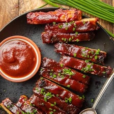 Tempeh prepared in a vegan rib-style dish.