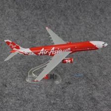 An AirAsia passenger airplane in its red-and-white livery