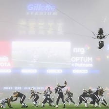 An overhead SkyCam suspended above a sports field