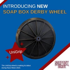 A gravity-powered Soap Box Derby car showing its wheel assembly.