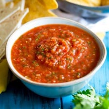 Bowls of salsa arranged by increasing spiciness