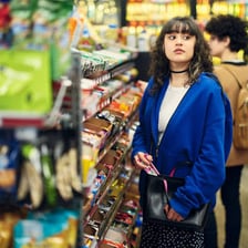 A person covertly taking merchandise from a store
