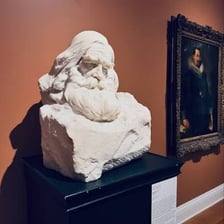 Marble bust displayed in a museum
