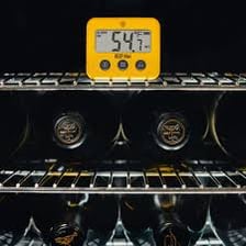 A household appliance showing an alert and making a beep