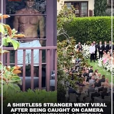 An unidentified person standing among a crowd