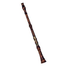 A wooden oboe with its keys and reed visible.