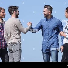 Two friends greeting each other informally.