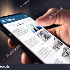 A person checking current news on a smartphone.