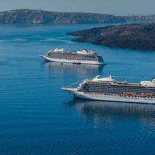 A cruise ship traveling across the open ocean
