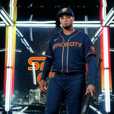 A Houston Astros baseball player in the team’s uniform.
