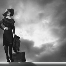 A classic film-noir portrait illustrating the femme fatale archetype.