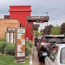 A drive-through lane at a restaurant.