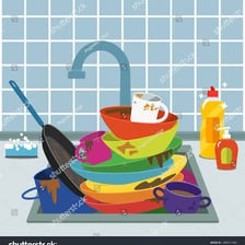 A pile of dirty unwashed dishes in a kitchen sink