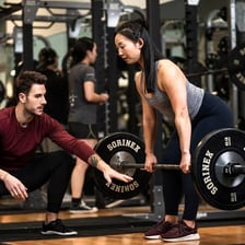 A person performing repeated weightlifting exercises