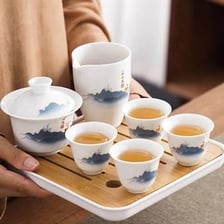 A cup of Chinese tea served in a traditional teacup.