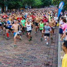 A runner taking part in a road race.
