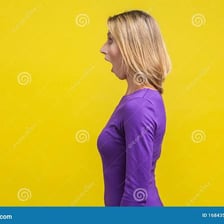 A person reacting with wonder to a spectacular view.
