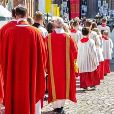 People taking part in a formal ceremonial procession