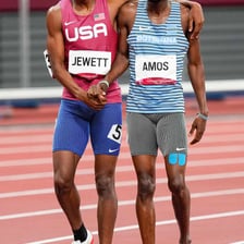 Competitors racing toward a finish line