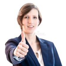A person signaling approval or permission