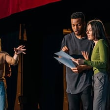 A person performing a pretend role in a scene