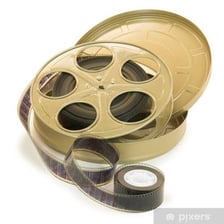 Cinematic film wound around reels.