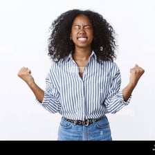 A relieved person celebrating that something has finally happened.