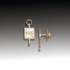 The key-shaped insignia of Phi Beta Kappa.