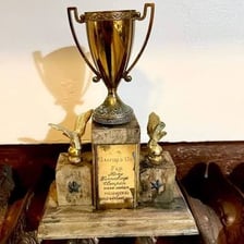 A former champion represented by an old trophy