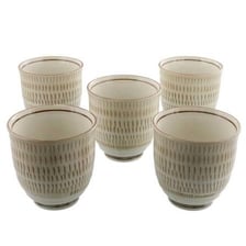 Green tea prepared in cups, representing nokcha and sencha.