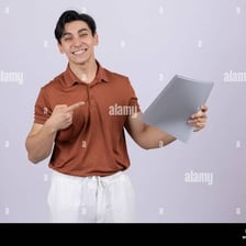 A person pointing to a small detail on a document.