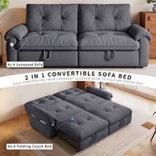A sofa opened into a bed in a guest room.