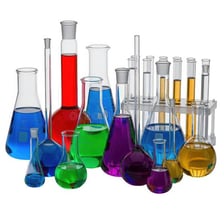 Several liquid samples in laboratory beakers.