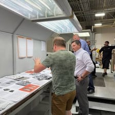 A printer examining a high-quality proof