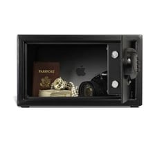 A passport placed inside an electronic hotel-room safe
