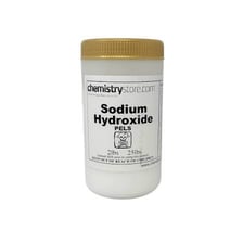 A labeled container of lye, or sodium hydroxide, used as a caustic chemical