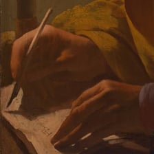 A poet writing verses in a notebook