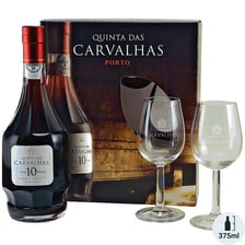 A glass and bottle of tawny port wine