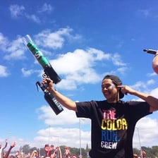 A T-shirt cannon launching shirts toward a crowd