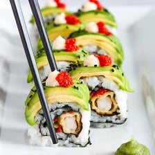 A dragon roll sushi dish topped or filled with eel
