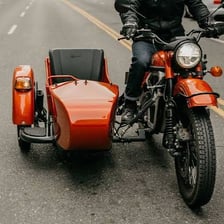 A motorcycle fitted with a sidecar