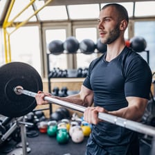 A person performing a set of exercises in a gym