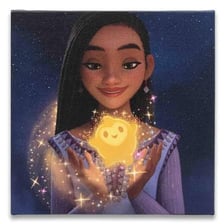 Asha standing with the magical Star from Disney's Wish