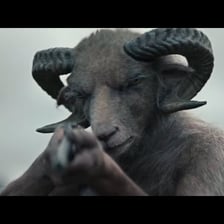 A frightening fictional monster depicted in a dark movie-like scene.
