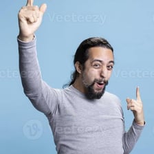 An enthusiastic person cheering with raised arms.