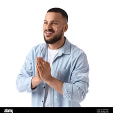 A person making a respectful greeting with palms pressed together
