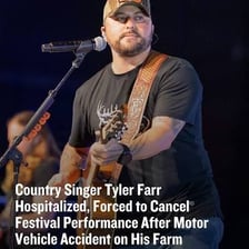 Tyler Farr performing onstage with a microphone.