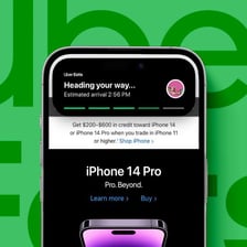 A smartphone displaying a ride-hailing arrival-time alert.