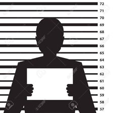A silhouetted suspect representing a criminal perpetrator.